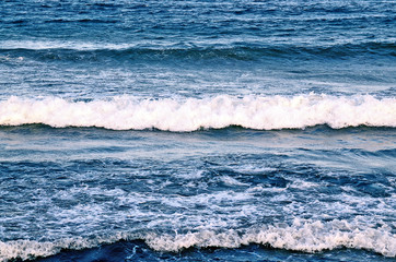 Blue ocean water with waves nature background.Relax,vacation or surfing concept.