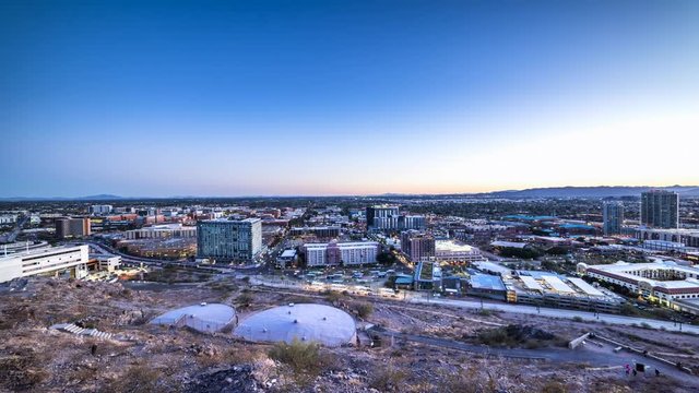 A day to night overlooking Arizona State University campus grounds