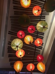 Decorative asian lamps hanging from the ceiling