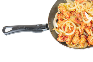Cooking, fried meat in a frying pan, isolated on white background.