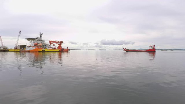 Vessel passing offshore supply base