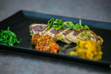 Detail on special designe for food on a wooden board.Food detail
