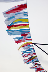 Colorful maritime signal flags on street