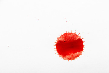 Fototapeta na wymiar drops of red blood on white paper