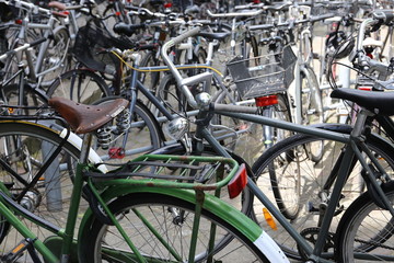 Fototapeta na wymiar a lot of bicycles parked at Copenhagen street Denmark