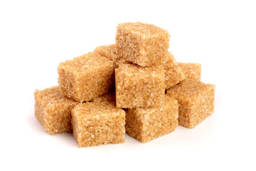 brown sugar cubes isolated on white background