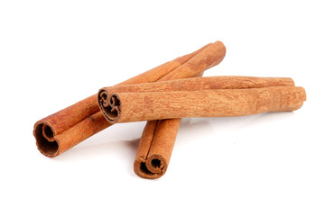 Cinnamon sticks isolated on white background. Top view