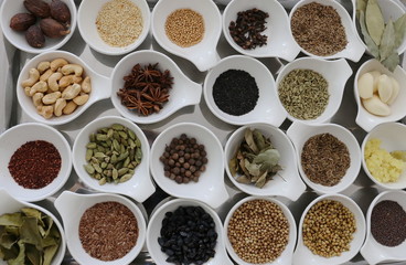 assortment of spices in the bowls