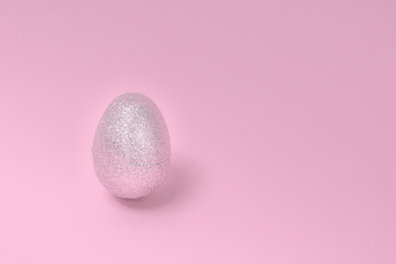 One egg on solid background