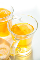 isolated tea with lemon on white background. Still life in a high key.
