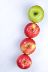 Apples, red apples on a white wooden background, fruits for breakfast, vitamins, vegetarian food, healthy food, American breakfast, lots of apples for designer, copy space, minimalism