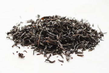 Dry black tea leaves heap
