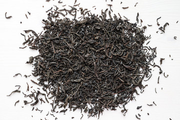 Dry black tea leaves heap