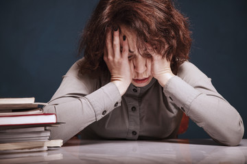 tired and exhausted woman working with documents