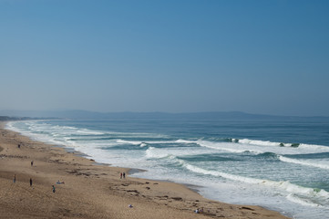 Fototapeta na wymiar People at the beach in Monterey Ca.