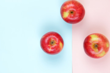 Apple, fruit pop art, red apple on a pink blue background, fruit for breakfast, vitamins, vegetarian food, pastel background, minimalism, designer blank, Asian food, American breakfast