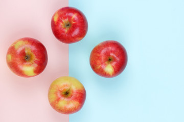 Apple, fruit pop art, red apple on a pink blue background, fruit for breakfast, vitamins, vegetarian food, pastel background, minimalism, designer blank, Asian food, American breakfast