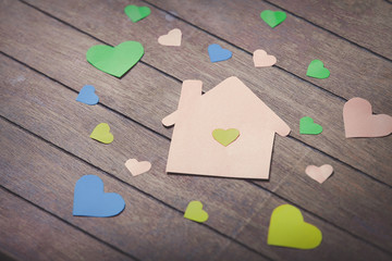 Paper house and heart shapes