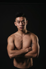 Fototapeta premium Portrait of young asian boy with fitness body.