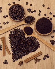 Coffee beans and ground coffee. Heart made of coffee beans. Toning.