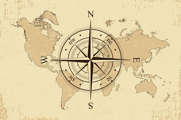 Vintage world map with retro compass. Background old paper map and wind rose. Vector illustration.