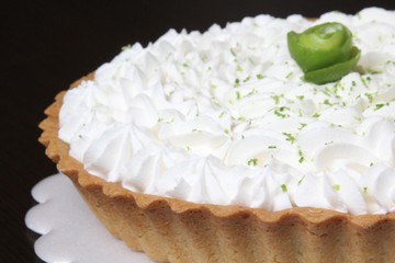 Lemon pie in dark background