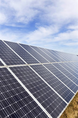 Solar Power Station on the early spring Meadow 