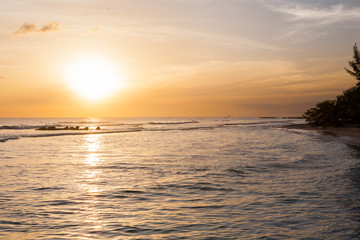 Landscape shot of Barbados Beach at Sunset, Caribbean Sea, Clouds Sky
