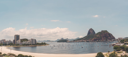 Panoramic view of Rio de Janeiro from a high point: Botafogo district with bay, multiple yachts in...