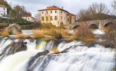 The famous Trinity Bridge, with the Ulzama River as it passes through Atarrabia, Navarra, Spain