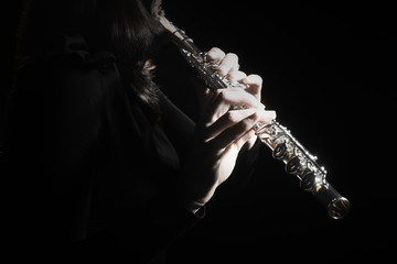 Flute instrument Flutist hands playing flute music - obrazy, fototapety, plakaty
