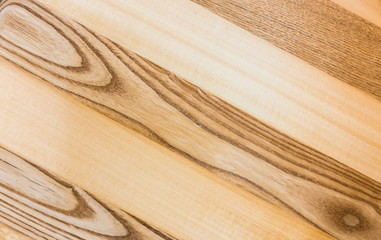 Linden and Ash wood texture A fragment of a wooden panel hardwood