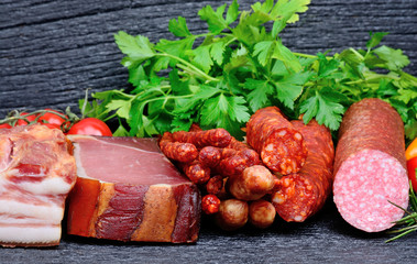 Delicious sausages on table