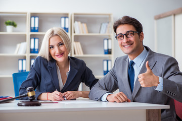Lawyer discussing legal case with client