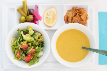 Creamy lentil soup with vegetable salad