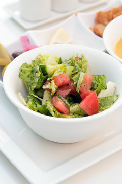 Fresh vegetable salad in white dish - healthy food