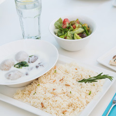 Shakriya - lamb meat in yoghurt sauce, served with white rice and salad