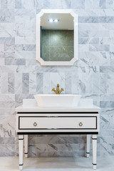 Interior of bathroom with sink basin faucet and mirror. Modern design of bathroom