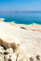 Obraz premium View of Dead Sea coastline. Salt crystals at sunset. Texture of Dead sea. Salty sea shore