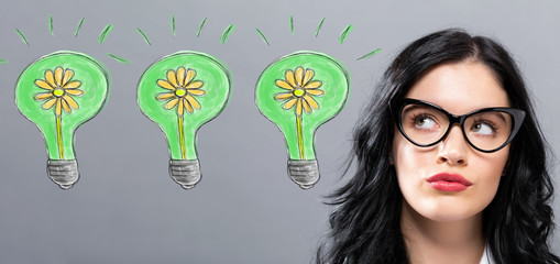 Eco Energy with young businesswoman in a thoughtful face