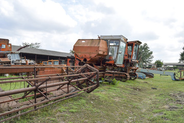 Fototapeta premium Old rusty disassembled combine harvester.