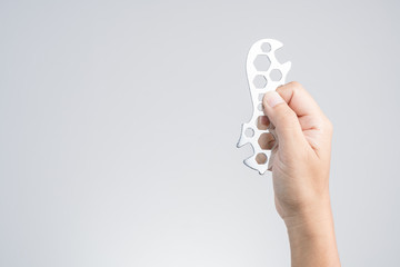 Hand holding portable multi function steel hexagon wrench spanner, a repair tool for bicycle