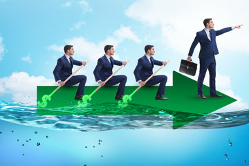 Teamwork concept with businessmen on boat