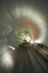 Inside the wind turbines. A wind farm is a group of wind turbines in the same location used for...