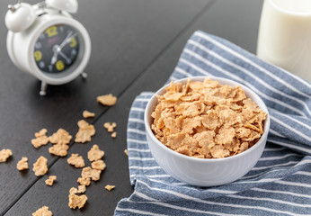 Healthy Corn Flakes with milk for Breakfast on table