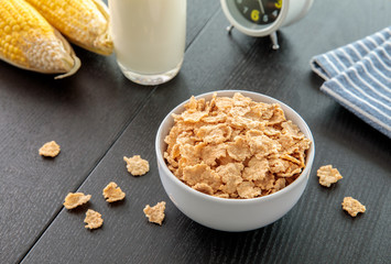 Healthy Corn Flakes with milk for Breakfast on table
