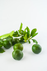 Lime. Fresh fruit with leaf isolated on white background.
