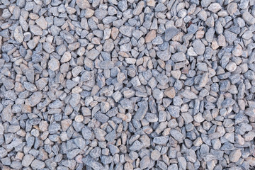 Stone pebbles texture background for interior exterior decoration and industrial construction concept design.