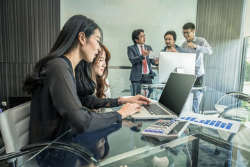 Group Of Asian Business people with casual suit working and talking together in the modern Office, people business group concept
