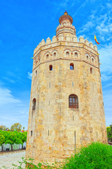 Fototapeta na wymiar Tower of Gold (Torre del Oro) is a military watchtower on Paseo